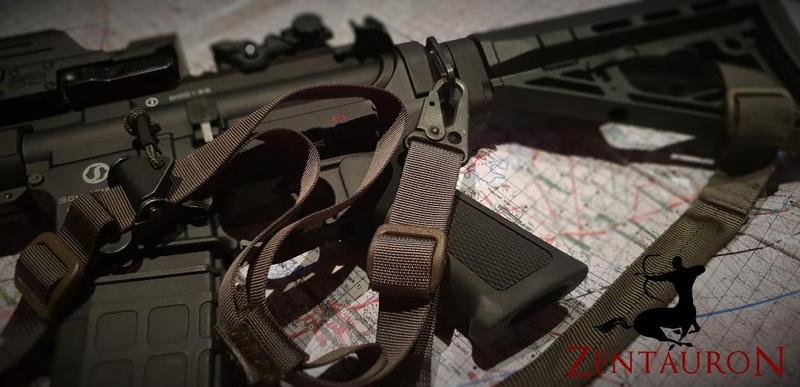 Rifle sling attached to the rifle